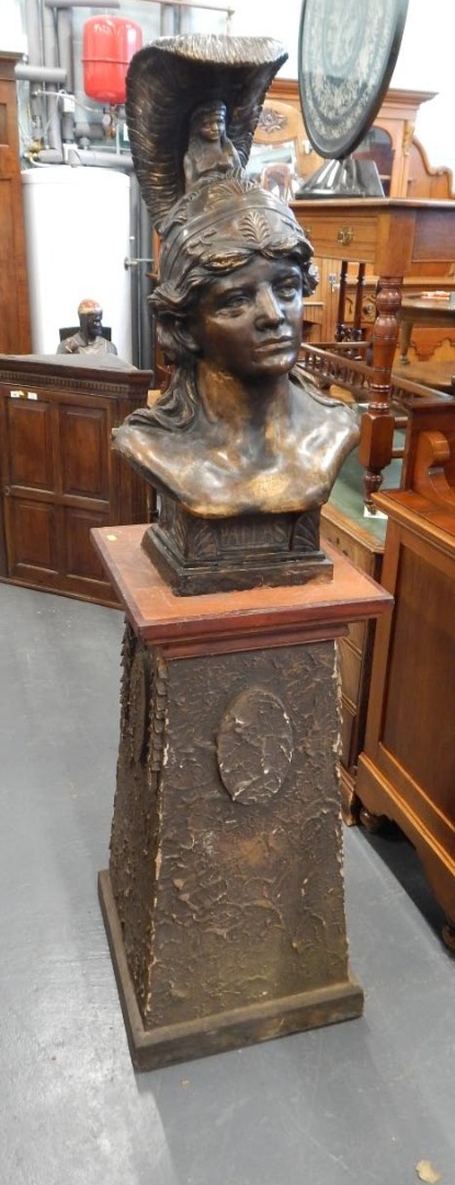 Appraisal: A bronzed composition bust modelled in the form of an