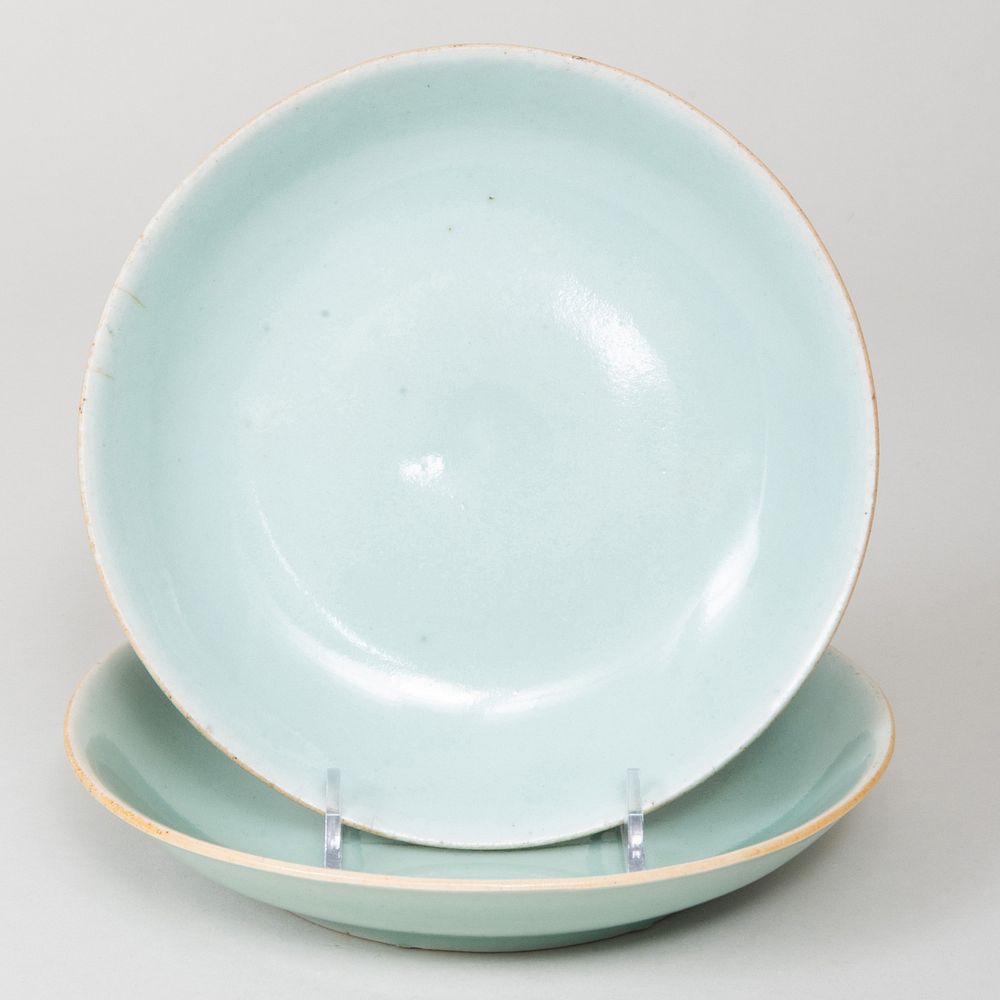 Appraisal: Two Chinese Celadon Glazed Porcelain Bowls Each with blue pseudo