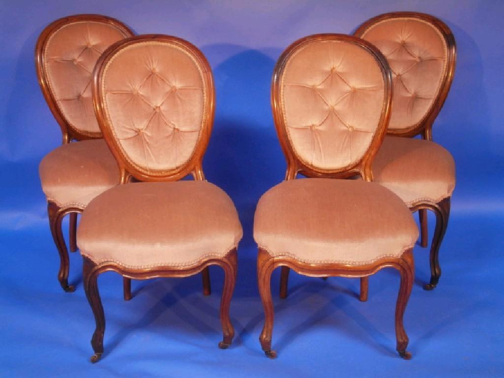 Appraisal: A set of four Victorian walnut framed drawing-room chairs with