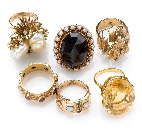 Appraisal: A collection of six gem-set rings including opal pearl diamond