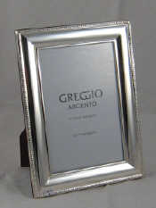 Appraisal: A silver faced photo frame with strut back x cm