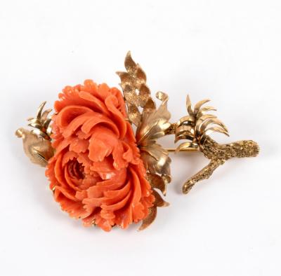 Appraisal: A coral brooch of flower form set in an unhallmarked