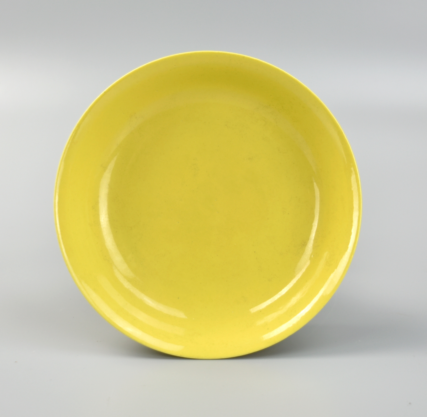 Appraisal: CHINESE YELLOW GLAZED PLATE W QIANLONG MARK the rounded sides