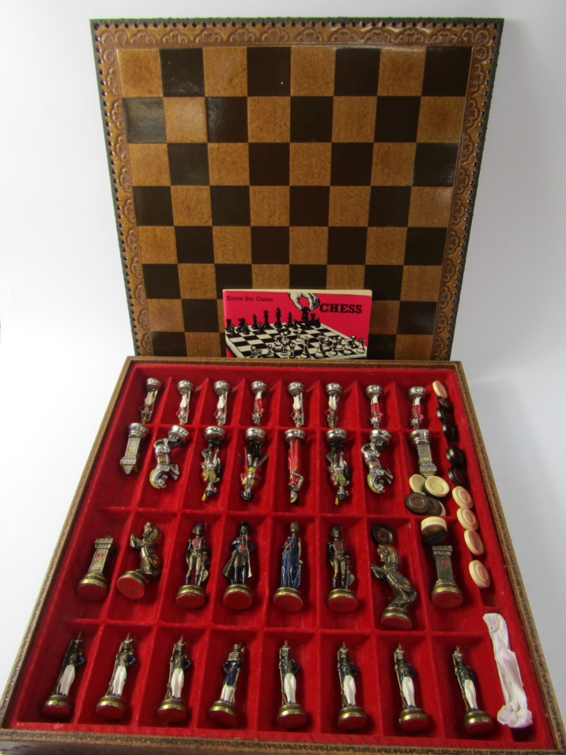 Appraisal: An Italian cast metal chess set modelled as Napoleonic figures