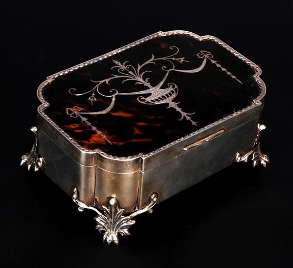 Appraisal: A silver and tortoiseshell pique jewellery box by William Comyns