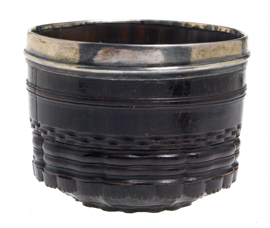 Appraisal: A TH CENTURY SILVER-MOUNTED ENGINE TURNED LIGNUM VITAE DIPPER CUP