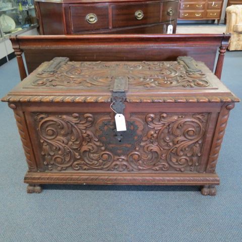 Appraisal: Mahogany Carved Chest elaborate rococo designswith fancy metalwork lock and