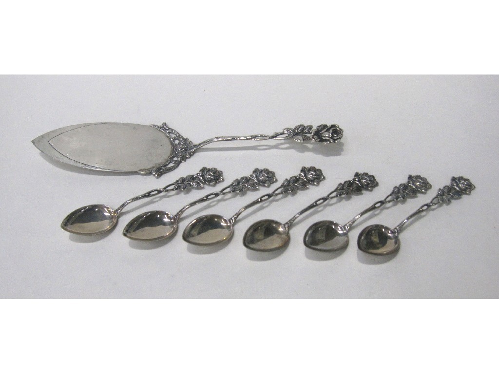 Appraisal: Lot comprising set of six white metal floral decorated spoons