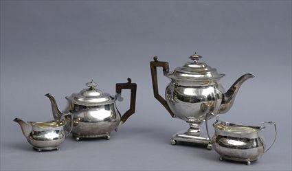 Appraisal: GEORGE III SILVER THREE-PIECE TEA SET AND A SIMILAR COFFEE