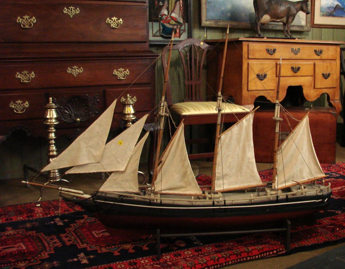 Appraisal: MODEL OF A TOPSAIL SCHOONER Hull painted black above waterline