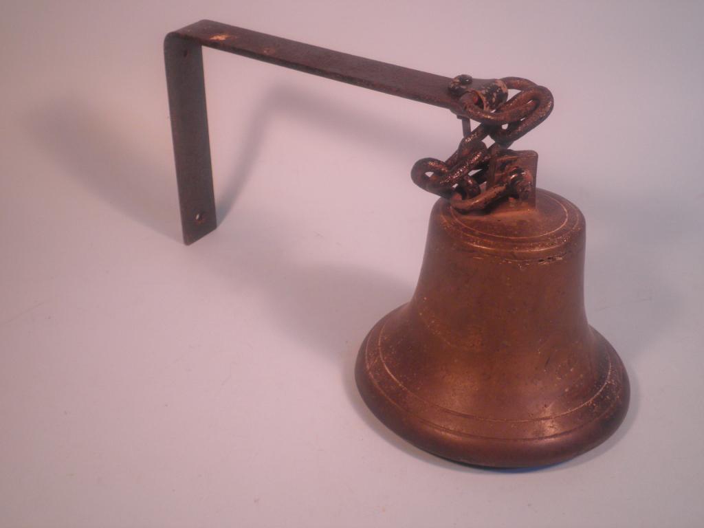 Appraisal: An early thC brass school bell with iron bracket cm