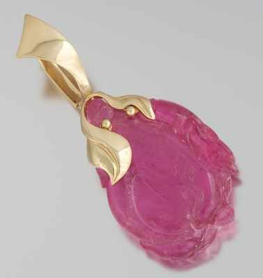 Appraisal: A Large Carved Pink Tourmaline and Gold Pendant k yellow