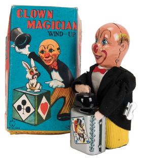 Appraisal: T N Clown Magician Wind-Up Toy Japanese wind-up toy lithographed