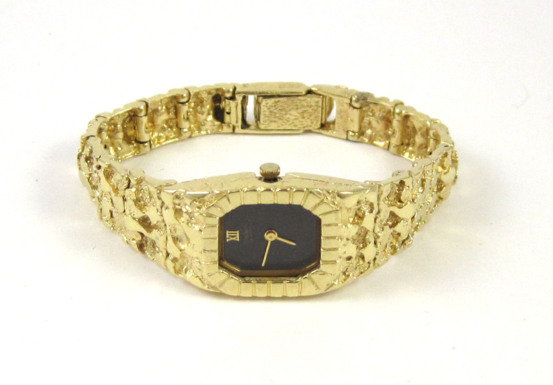 Appraisal: LADY'S SEIKO QUARTZ GOLD INTEGRAL BRACELET WRISTWATCH heavy K yellow