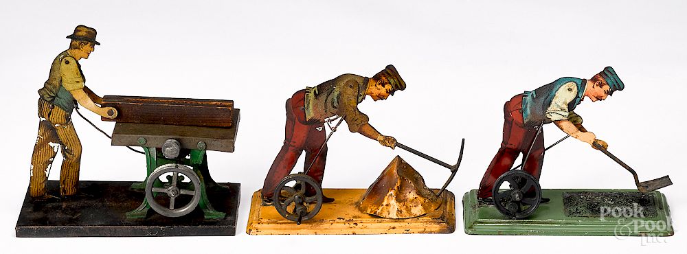 Appraisal: Three tin lithograph workmen steam toy accessories Three tin lithograph