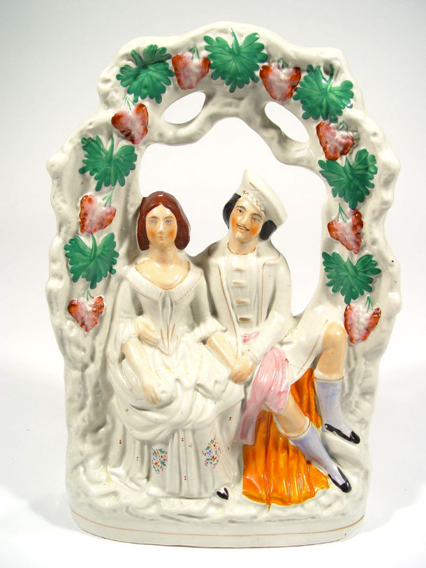 Appraisal: Large hand painted Victorian Staffordshire figure group of lovers under