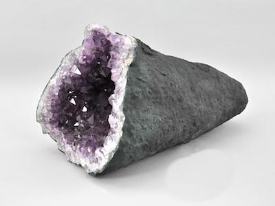 Appraisal: A Large Natural Amethyst Geode Conical shape with black exterior