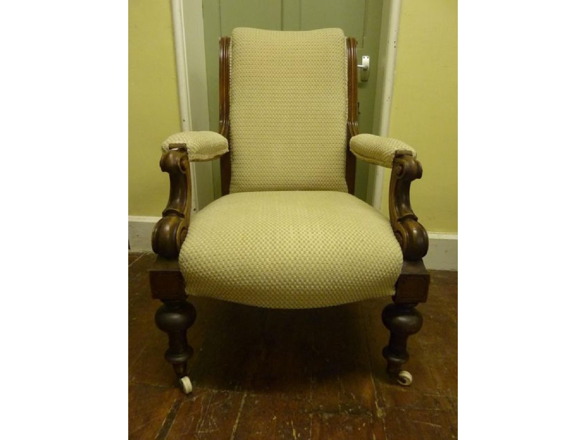 Appraisal: A Victorian drawing room chair with serpentine upholstered seat and