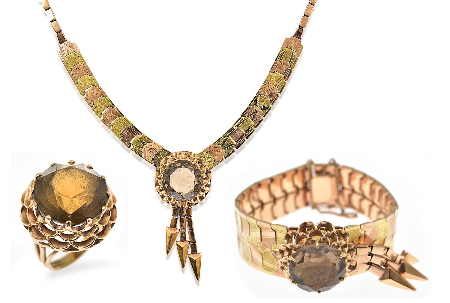 Appraisal: A GOLD AND GEM-SET COCKTAIL SUITE Comprising a necklace bracelet