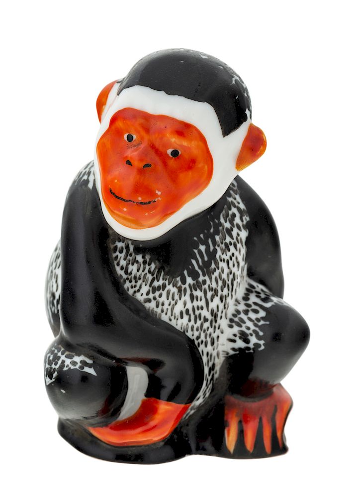 Appraisal: A SOVIET PORCELAIN CHESS PIECE OF A BLACK MONKEY AFTER