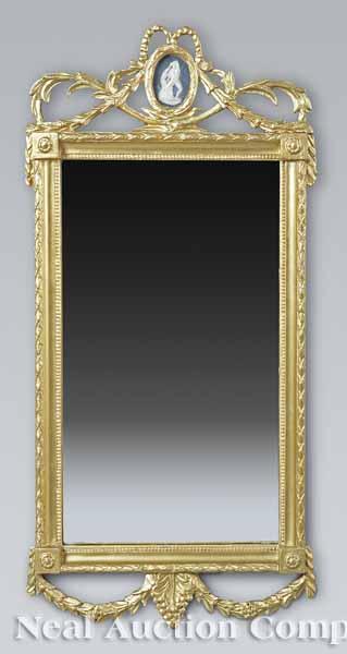 Appraisal: An Antique Italian Neo-Classical Giltwood Mirror th c the crest