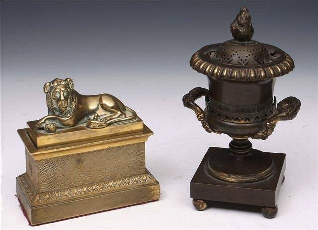 Appraisal: A REGENCY LACQUERED GILT SARCOPHAGUS SHAPED INK STAND with seated