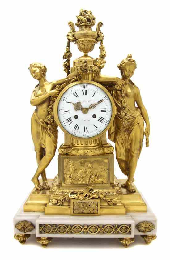 Appraisal: A French Gilt Bronze and Alabaster Figural Mantel Clock Baullier