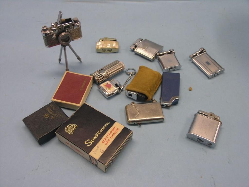 Appraisal: A Lumix camera-lighter and other cigarette lighters