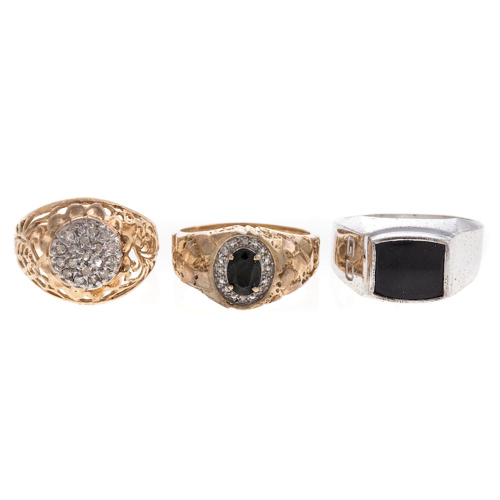 Appraisal: A Trio of Gentlemen's Rings with Diamonds K yellow gold