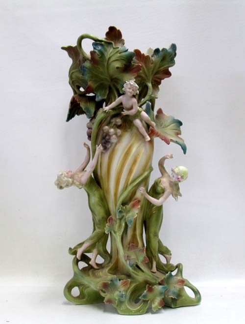 Appraisal: GERMAN PORCELAIN VASE having an exterior of applied figures and