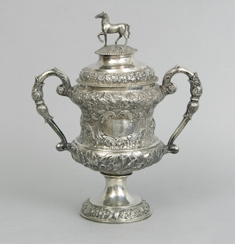 Appraisal: An Irish Silver Trophy A lavishly embellished silver trophy with