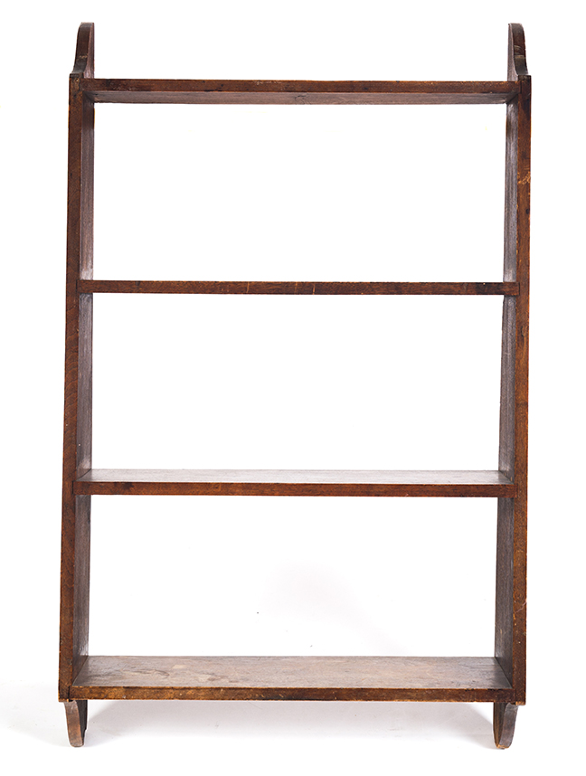 Appraisal: AMERICAN WALL SHELF Nineteenth century Walnut three-tiered wall shelf with