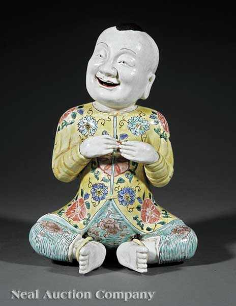 Appraisal: A Chinese Biscuit Glazed Famille Verte Porcelain Figure of a