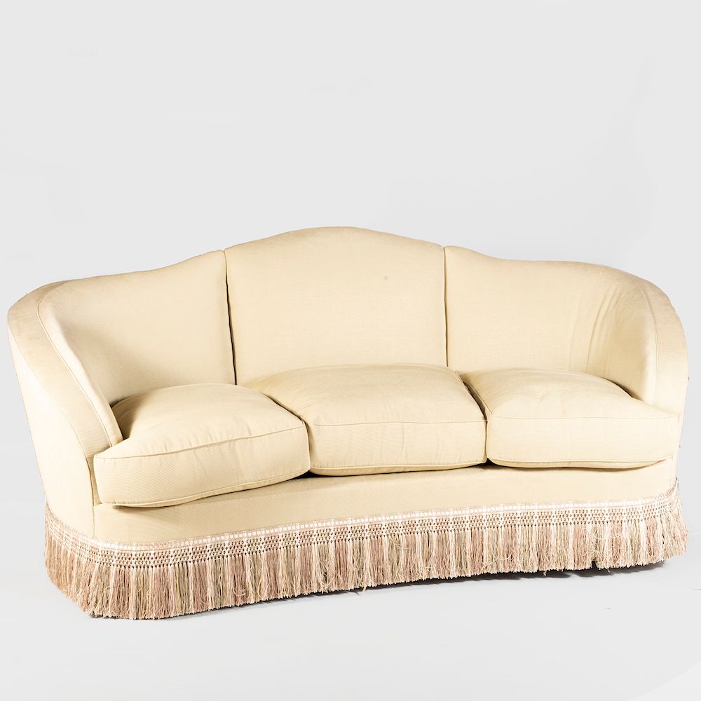 Appraisal: Modern Upholstered Camel Back Sofa with Fringe x x in