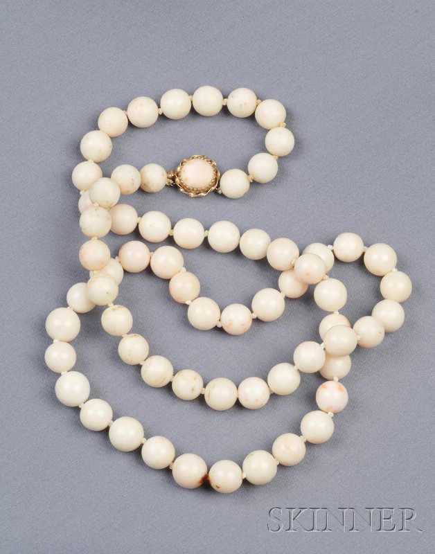 Appraisal: Angelskin Coral Bead Necklace composed of sixty-four beads ranging in