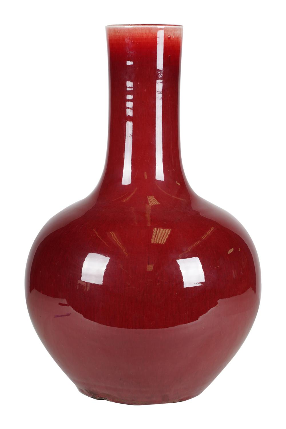 Appraisal: CHINESE OXBLOOD PORCELAIN VASEunmarked no stand inches diameter inches high