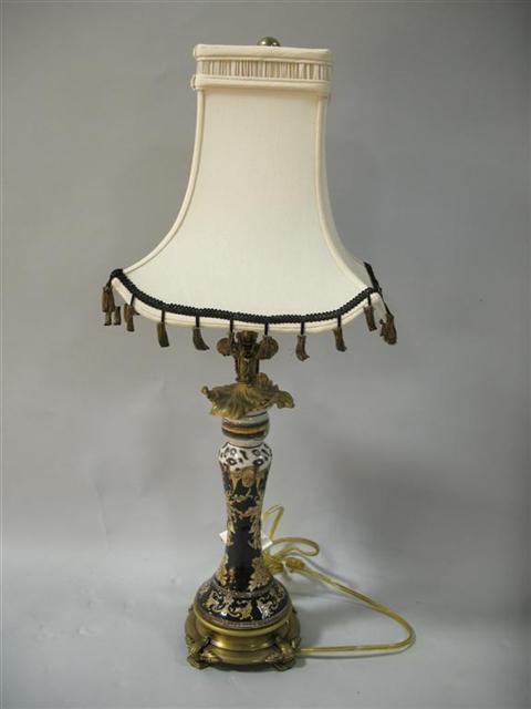 Appraisal: GILT-MOUNTED PORCELAIN BEDSIDE LAMP John Richard Lighting the porcelain of