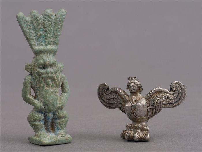 Appraisal: EGYPTIAN TURQUOISE-GLAZED FAIENCE FIGURE OF BES AND A GREEK HELLENISTIC