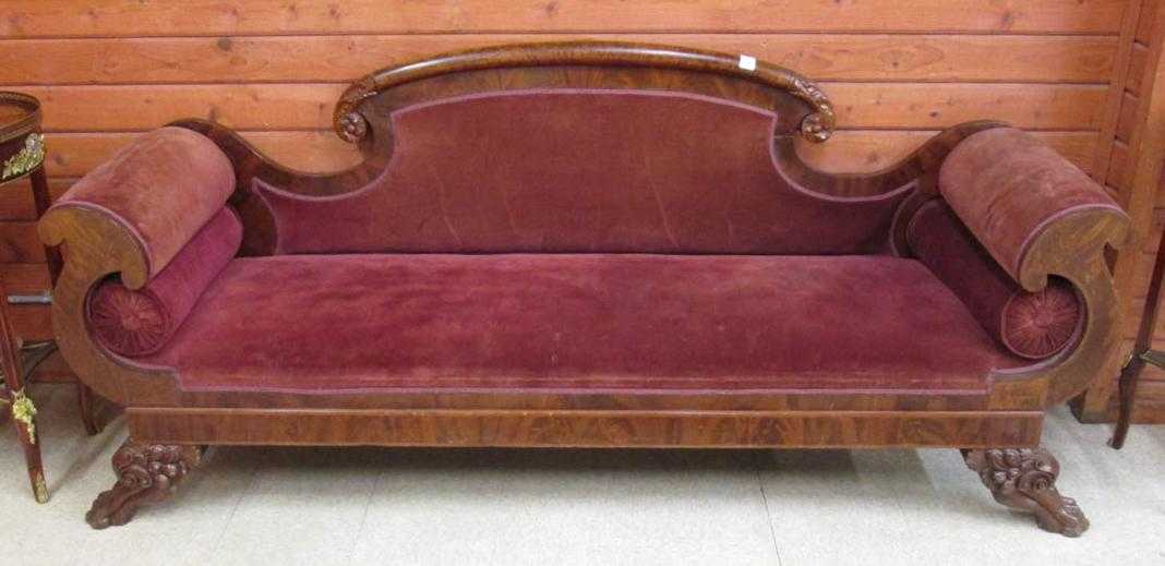 Appraisal: CLASSIC EMPIRE MAHOGANY SOFA American c - featuring an arched