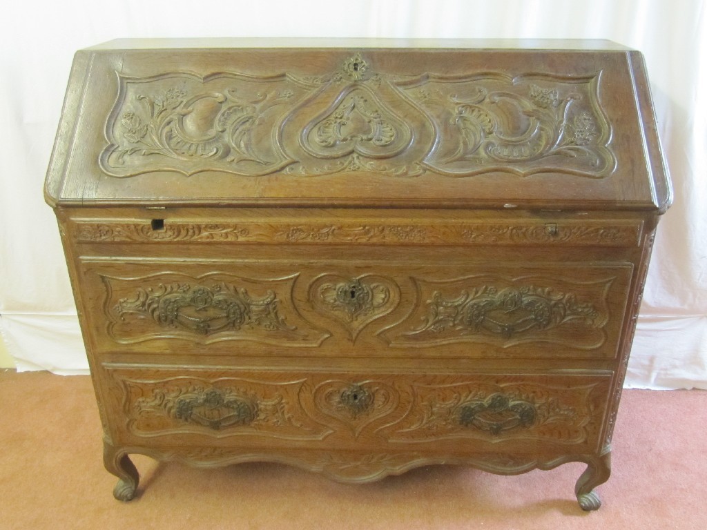 Appraisal: A th Century oak writing bureau possibly continental the drop