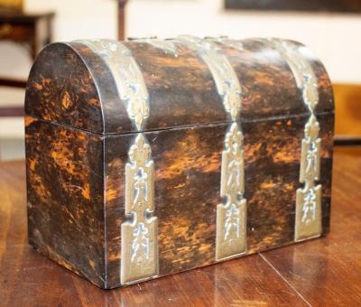 Appraisal: A Victorian coromandel and brass mounted box with swing carry