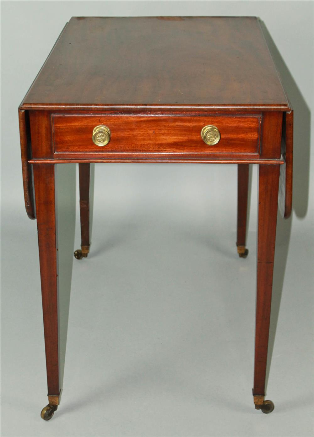 Appraisal: GEORGIAN MAHOGANY PEMBROKE TABLE having a rectangular top with drop