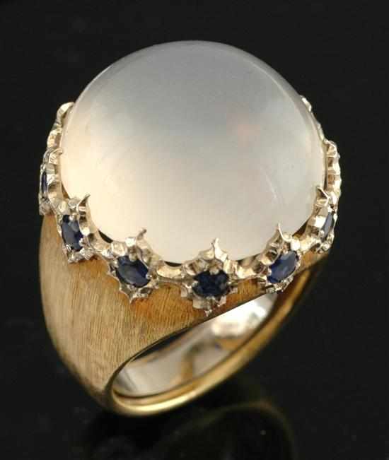 Appraisal: A moonstone and sapphire cocktail ring by Buccellati The large