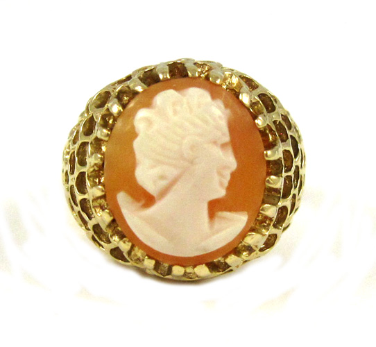 Appraisal: CAMEO AND FOURTEEN KARAT GOLD RING with yellow gold prongs