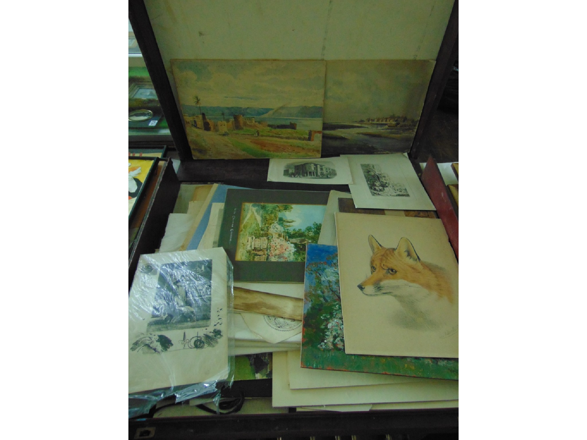 Appraisal: A large case portfolio containing a quantity of unframed pictures