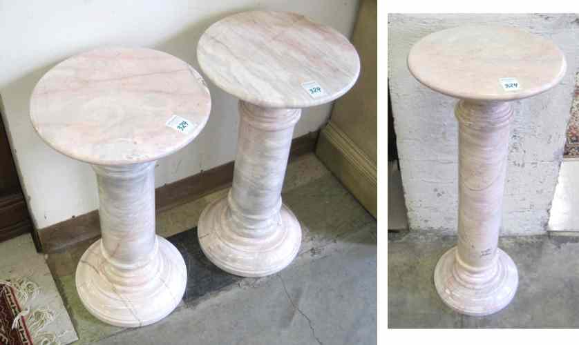 Appraisal: THREE SIMILAR MARBLE PEDESTALS all of solid rose gray marble