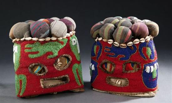 Appraisal: TWO WEST AFRICAN GLASS-BEADED CLOTH AND COWRIE SHELL MASKS Cameroon