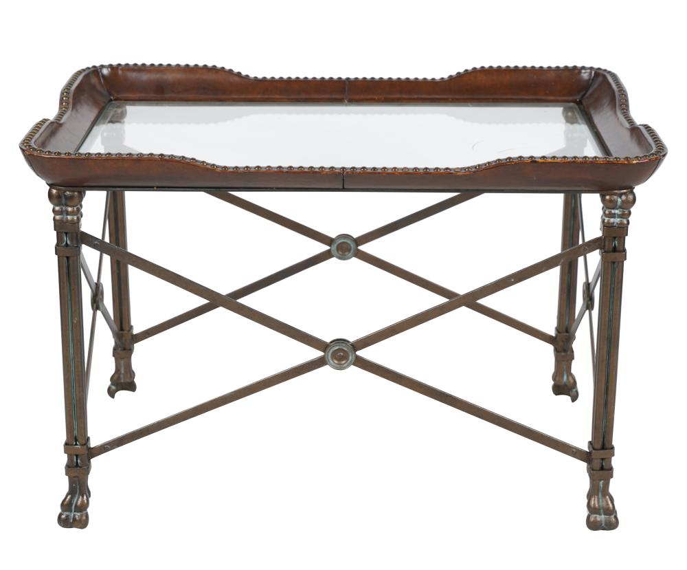 Appraisal: IRON STUDDED LEATHER GLASS COFFEE TABLEin the French Neoclassic style