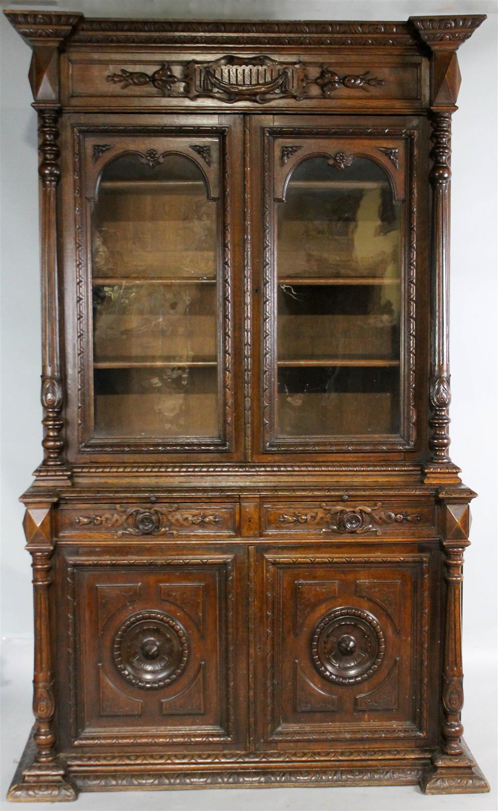 Appraisal: RENAISSANCE REVIVAL CARVED OAK CABINET in two parts the upper