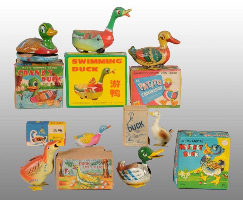 Appraisal: Lot of Tin Duck Toys Description Spanish Chinese and Japanese